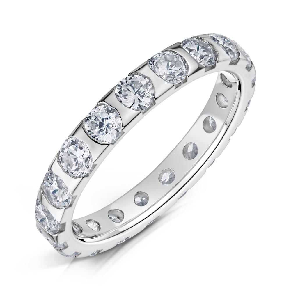 Micola, half claw set eternity ring